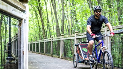 Man riding a bike in the forest