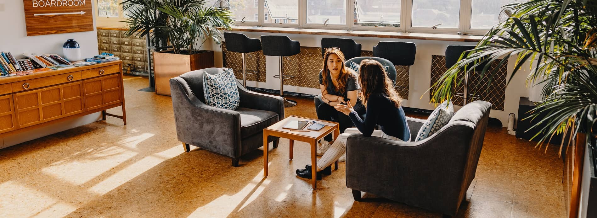 women talking at work